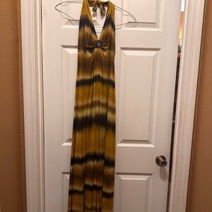 Used Gold Brown and Cream colored Maxi Dress. Size medium.